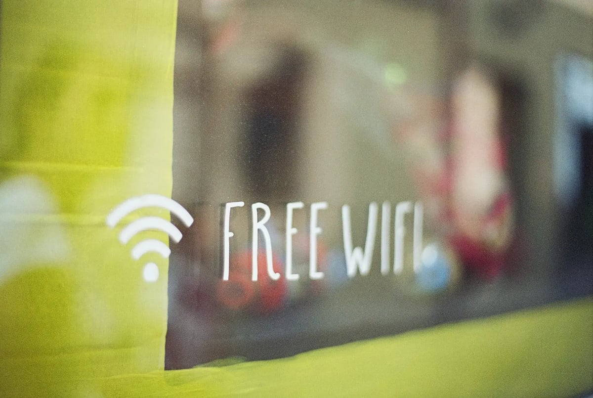 free wifi written in white on a window