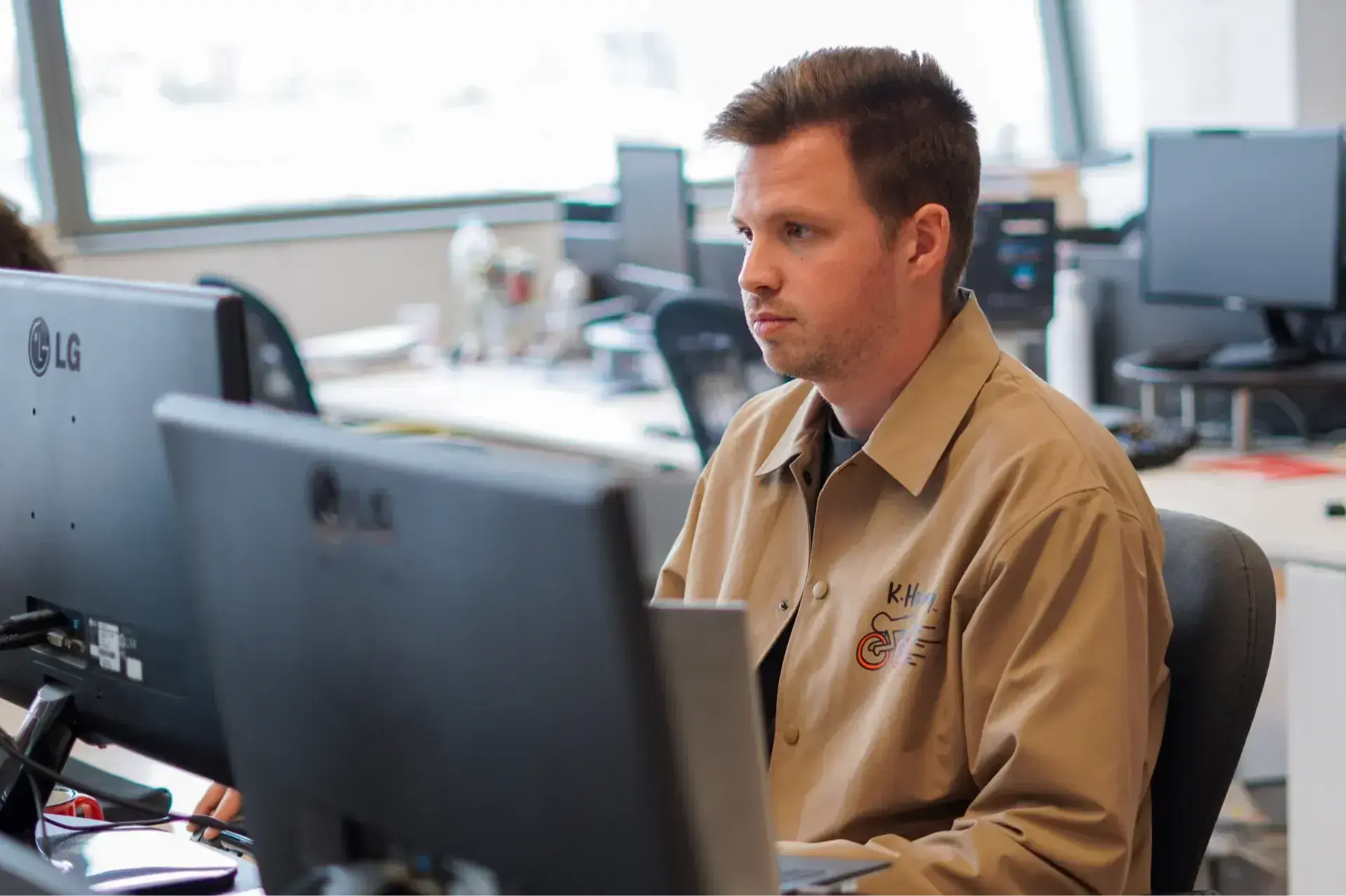 A Cyberclick employee working on his computer