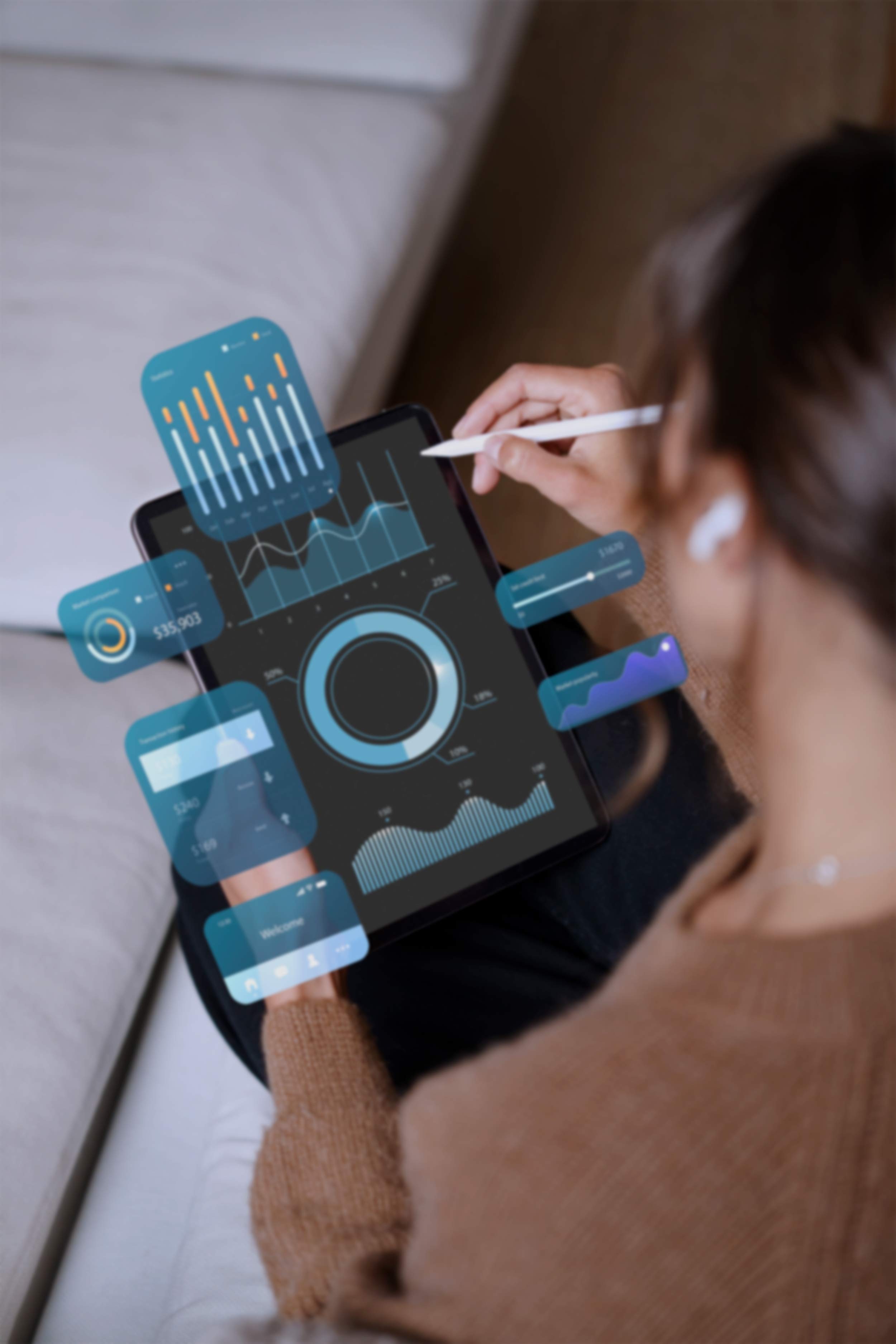 A girl holds a tablet with various analysis graphs
